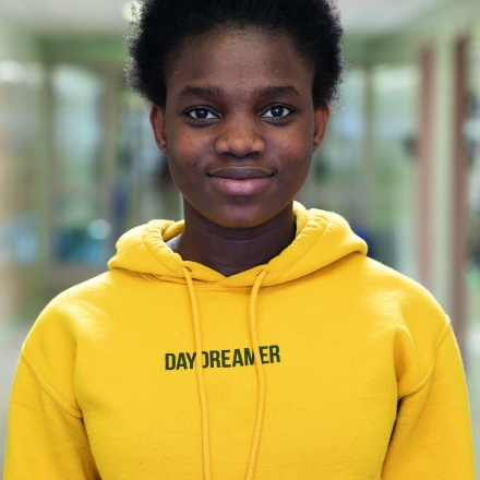 Image of MassBay student wearing sweatshirt that says Day Dreamer