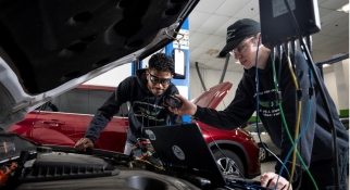 MassBay Automotive Students Do A Computer Test on a Car